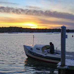 Stuart Downie boats away on the chilly bay.