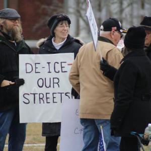 Many showed with creative signs playing on the word "ice."