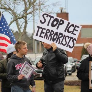 Manfred Wiegandt speaks to a young protestor. 