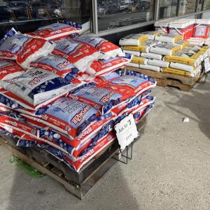 Bags of salt outside of the Aubuchon Ace Hardware. 