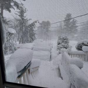 Somewhere under all that snow is  Kevin McQuade's vehicles. Photo source: Kevin McQuade