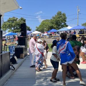 Festival-goers dance with John Miranda during his performance. Photo by Christian Uva