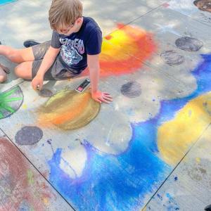 Ender, 12, made a night sky design with his friend Luca, 8. Photo by Christian Uva