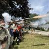 During the plaque ceremony, the Wareham Minutemen and Militia performed a three-musket volley salute by firing their arms.