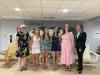 Club President Tara Calabrese and Scholarship Chair Kathy Tibbetts pose with the recipients.